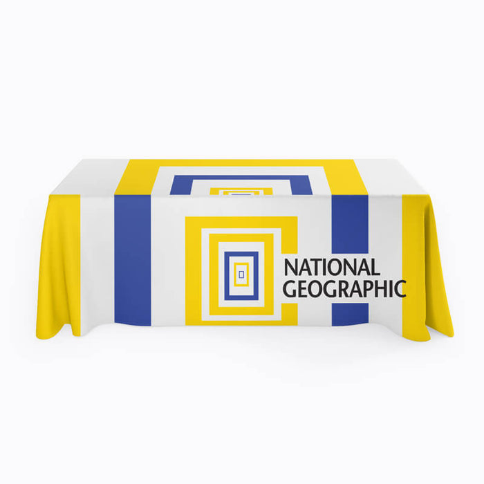 A table covered in a custom table throw with National Geographic branding.